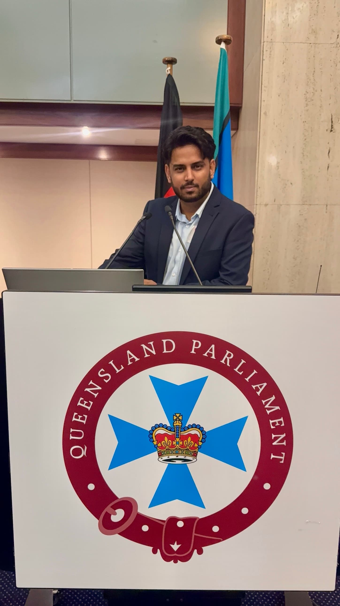 GP Singh at the lectern in Queensland Parliament